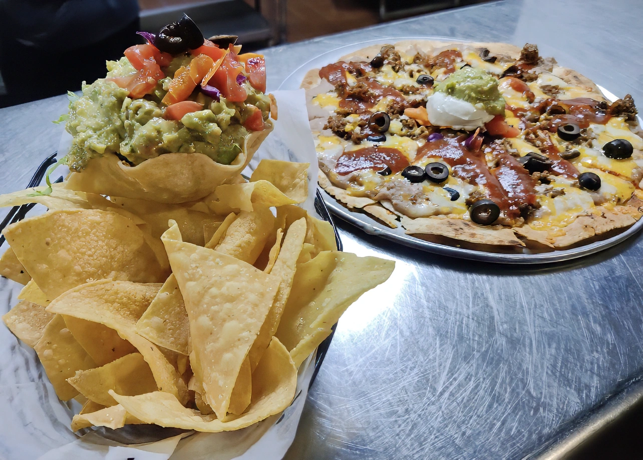 Guacamole Salad A generous serving of our delicious freshly made guacamole. Served with hand cut corn chips